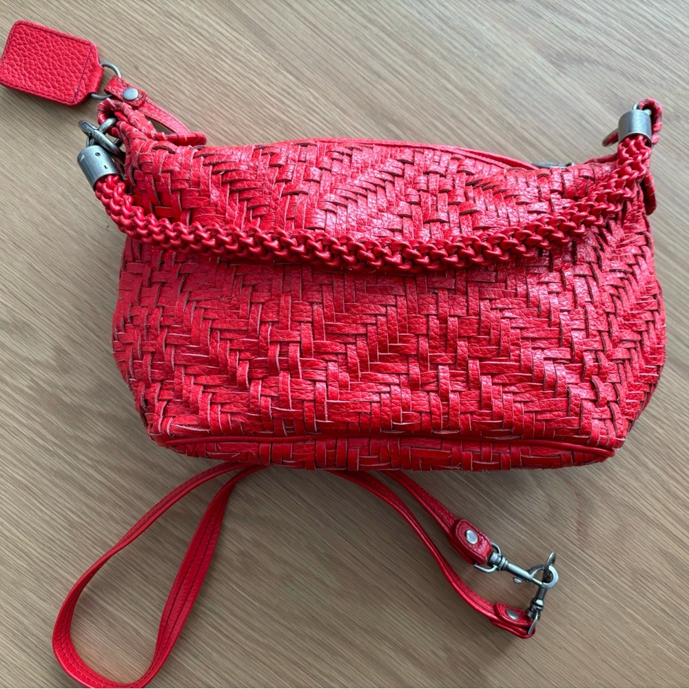 Red woven leather handbag
